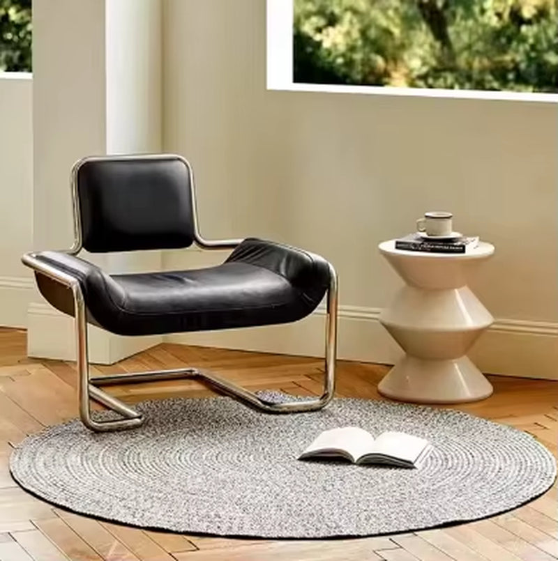 Nordic Designer Stainless Steel Convex Lounge Chair for Living Room and Private Spaces